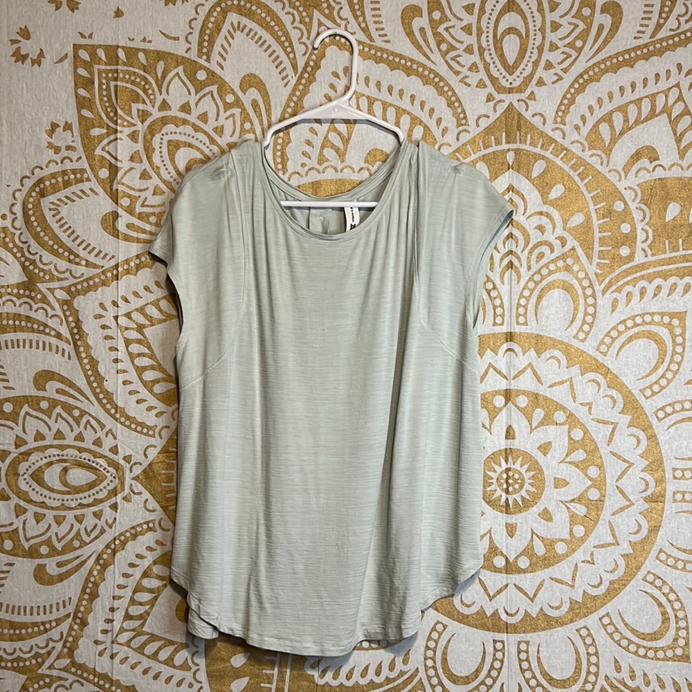 Light green gym shirt with a cinched neckline